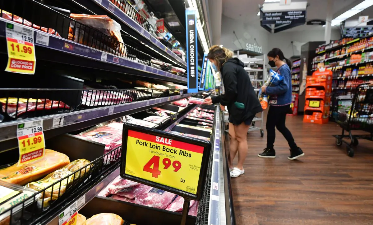 People shop at a grocery store in Monterey Park, Calif., on April 12, 2022. (Frederic J. Brown/AFP via Getty Images)
