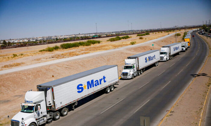 Trucks wait in a queue to cross into the United States near in the Cordova of the Americas International border bridge connecting the city of Ciudad Juarez to El Paso, Texas, in Ciudad Juarez, Mexico, on April 13, 2022. (Jose Luis Gonzalez/Reuters)
