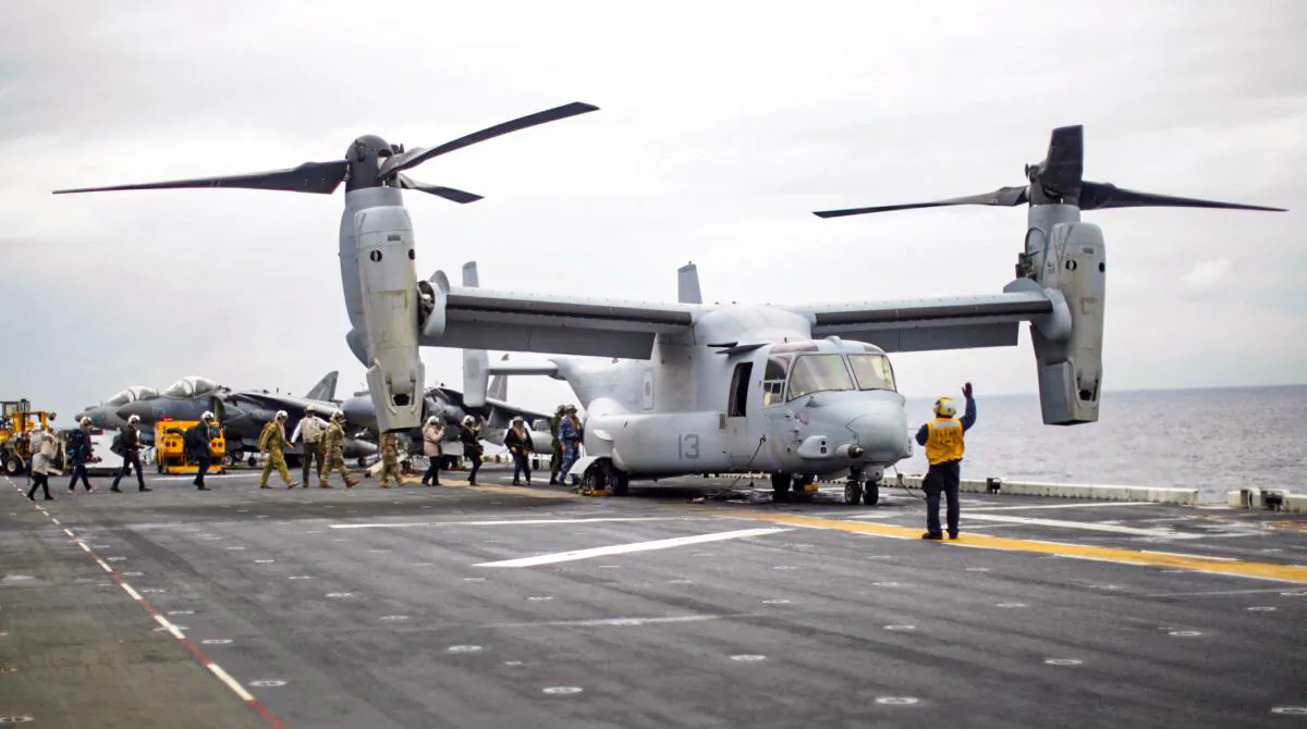 FIle photo: Participants in a ceremony marking the start of Talisman Saber 2017, a biennial joint military exercise between the United States and Australia, board a U.S. Marines MV-22B Osprey Aircraft on the deck of the USS Bonhomme Richard amphibious assault ship off the coast of Sydney, Australia, June 29, 2017. (Reuters/Jason Reed/File Photo)