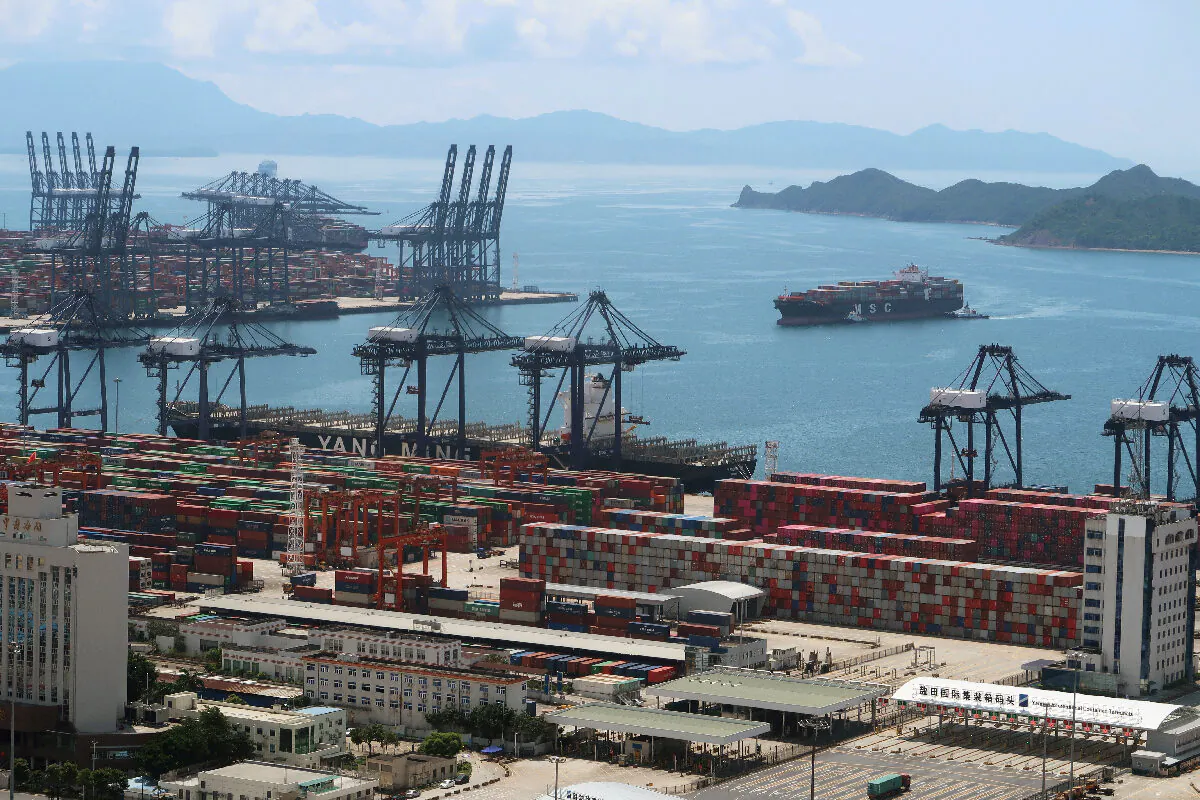 A cargo ship is carrying containers near the Yantian port in Shenzhen, in China's Guangdong Province, on May 17, 2020. (Martin Pollard/Reuters)