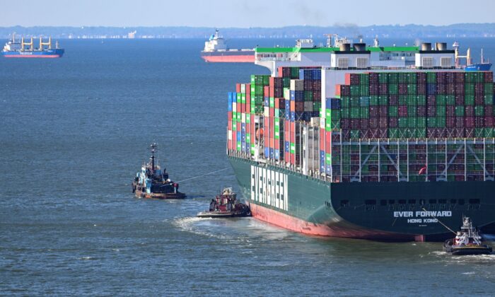 Evergreen Marine's Ever Forward container ship is taken to an anchorage south of the Chesapeake Bay Bridge on March 13, 2022. (Jerry Jackson/The Baltimore Sun via AP)