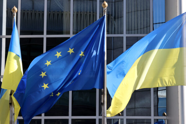 The Ukrainian flag flutters along side the European Union flag