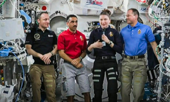 (L–R) ESA (European Space Agency) astronaut Matthias Maurer and NASA astronauts Raja Chari, Kayla Barron, and Tom Marshburn speak at a press conference at the International Space Station on April 15, 2022. (NASA/Screenshot via The Epoch Times)
