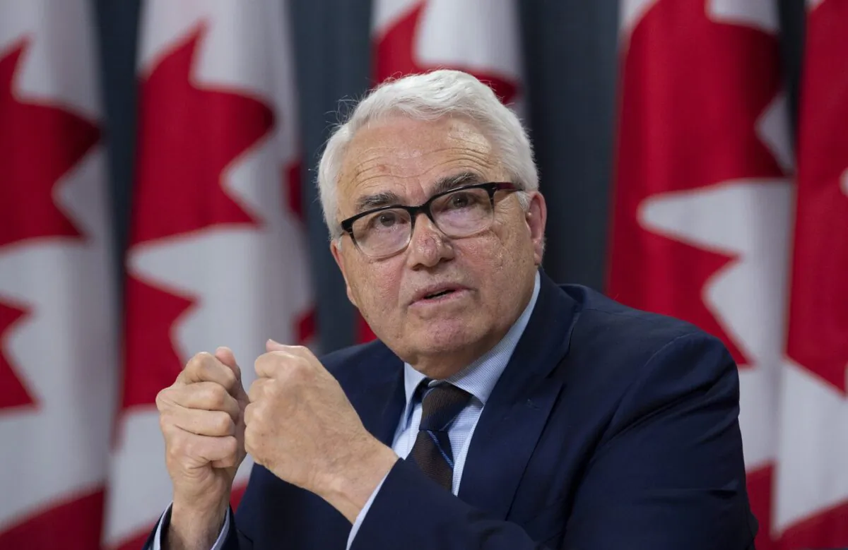 Official Languages Commissioner Raymond Theberge responds to a question during a news conference in Ottawa on May 9, 2019. (The Canadian Press/Adrian Wyld)