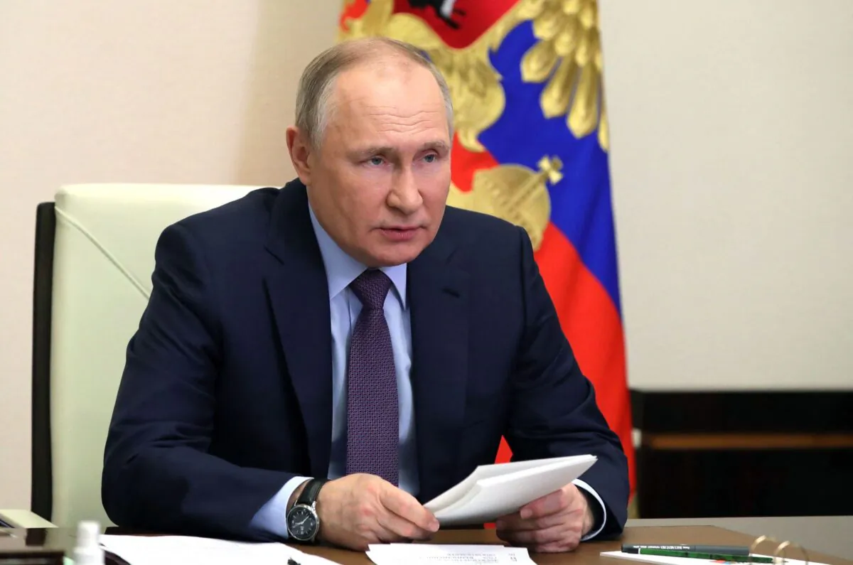 Russian President Vladimir Putin chairs a meeting on the situation in the oil and gas sector at the Novo-Ogaryovo state residence outside Moscow, on April 14, 2022. (Mikhail Klimentyev/Sputnik/AFP via Getty Images)