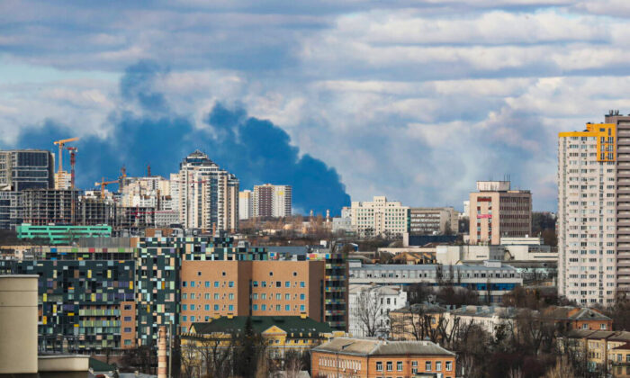 Smoke rising after shelling on the outskirts of the city is pictured from central Kyiv, Ukraine, on Feb. 27, 2022. (Irakli Gedenidze/Reuters)