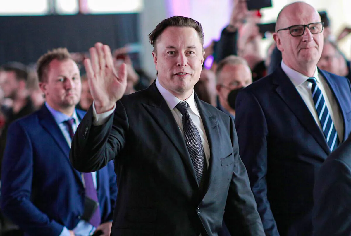 Tesla CEO Elon Musk (C) attends the official opening of the new Tesla electric car manufacturing plant near Gruenheide, Germany, on March 22, 2022. (Christian Marquardt/Pool/Getty Images)