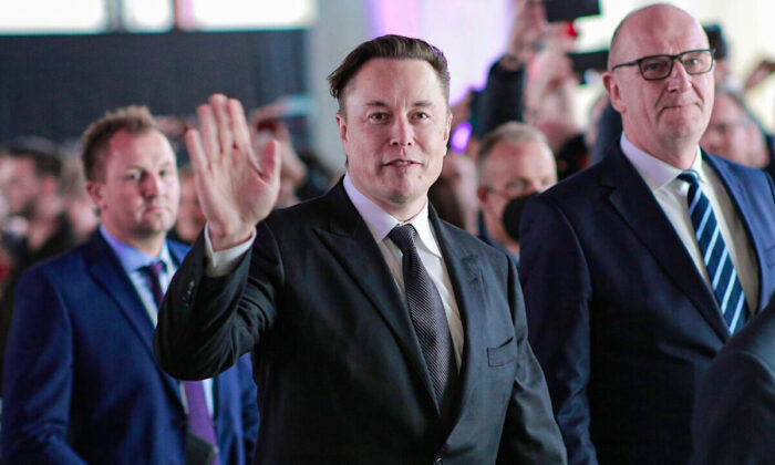 Tesla CEO Elon Musk (C) attends the official opening of the new Tesla electric car manufacturing plant near Gruenheide, Germany, on March 22, 2022. (Christian Marquardt/Pool/Getty Images)
