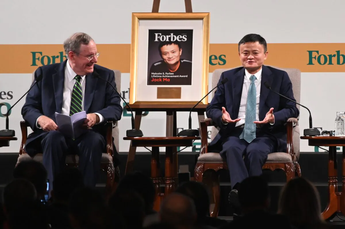 Jack Ma (R), co-founder and former executive chair of Alibaba Group, speaks next to Steve Forbes (L), chairman and editor-in-chief of Forbes media, during the Forbes Global CEO Conference in Singapore on October 15, 2019. (Photo by Roslan RAHMAN / AFP) (Photo by ROSLAN RAHMAN/AFP via Getty Images)