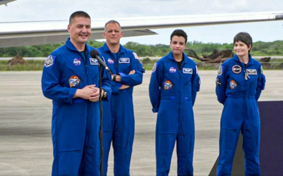 (L–R) SpaceX Crew-4 astronauts Kjell Lindgren, Bob Hines, Jessica Watkins, and Samantha Cristoforetti at NASA's Kennedy Space Center in Cape Canaveral, Fla., on April 18, 2022. (NASA via AP/Screenshot via The Epoch Times)