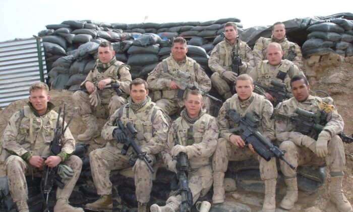 Lionel Desmond (front row, far right) was part of the 2nd battalion, of the Royal Canadian Regiment, based at CFB Gagetown and shown in this 2007 handout photo taken in Panjwai district in between patrol base Wilson and Masum Ghar in Afghanistan. (The Canadian Press/HO-Facebook-Trev Bungay) 