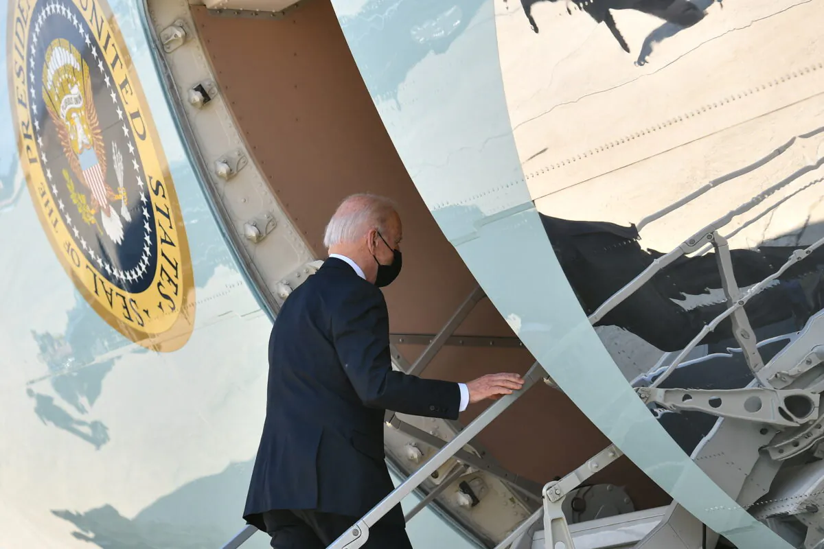 President Joe Biden boards Air Force One before departing from Joint Base Andrews in Maryland on April 19, 2022. (Mandel Ngan/AFP via Getty Images)