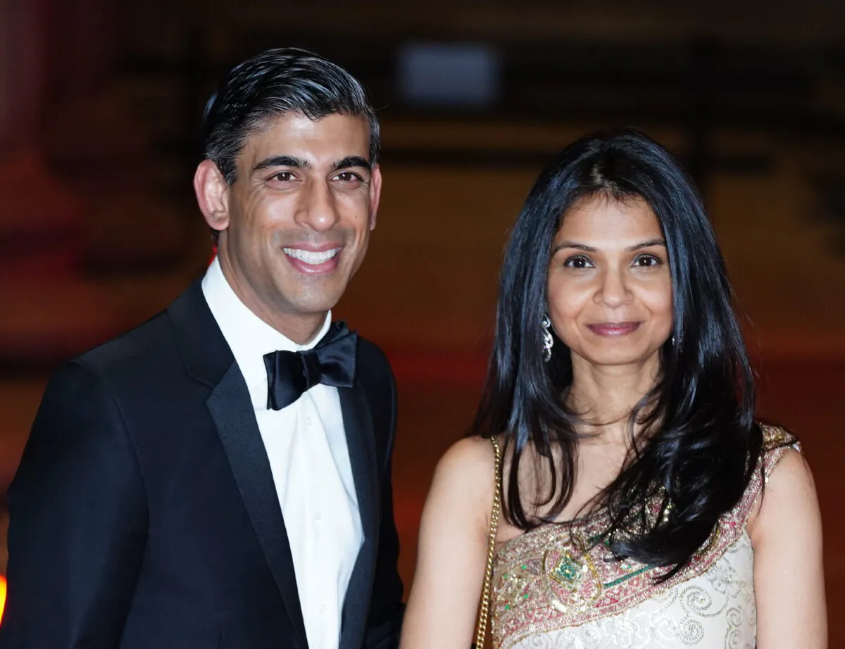 Chancellor of the Exchequer Rishi Sunak alongside his wife Akshata Murty attend a reception to celebrate the British Asian Trust at the British Museum in London on Feb. 9, 2022. (Ian West/PA Media)