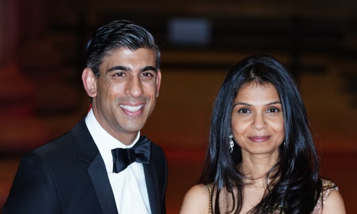 Chancellor of the Exchequer Rishi Sunak alongside his wife Akshata Murty attend a reception to celebrate the British Asian Trust at the British Museum in London on Feb. 9, 2022. (Ian West/PA Media)