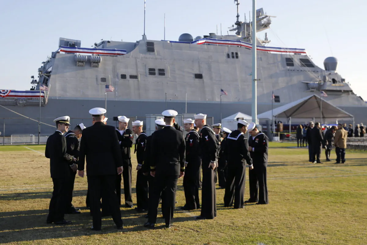 Crew members of the USS Sioux City, a Freedom-class of littoral combat ship, gather before the ship's commissioning ceremony at the U.S. Naval Academy in Annapolis, Md., on Nov. 17, 2018. (AP Photo/Patrick Semansky, File)
