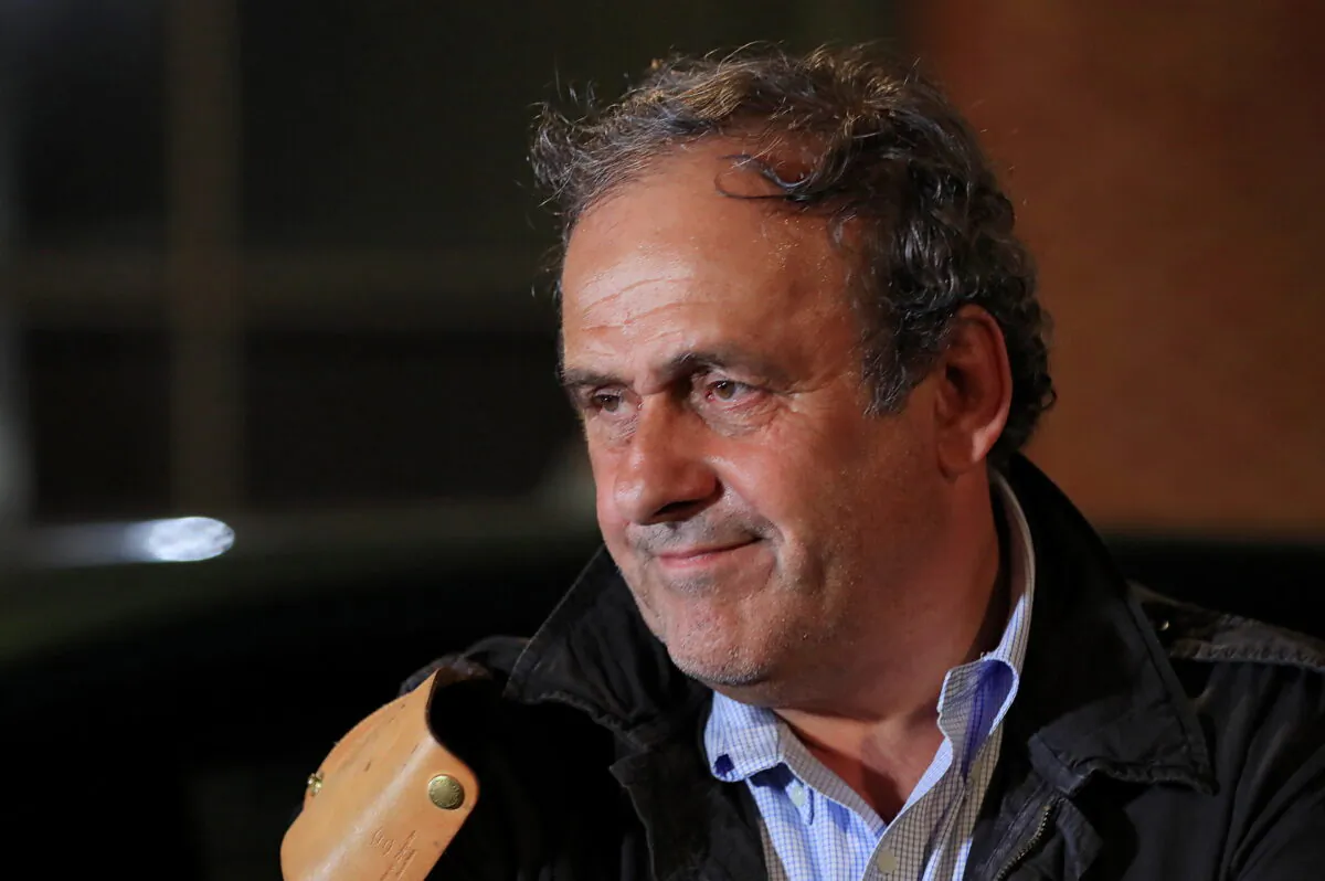 Former head of European football association UEFA Michel Platini leaves a judicial police station where he was detained for questioning over the awarding of the 2022 World Cup soccer tournament, in Nanterre, France, on June 19, 2019. (Gonzalo Fuentes/Reuters)
