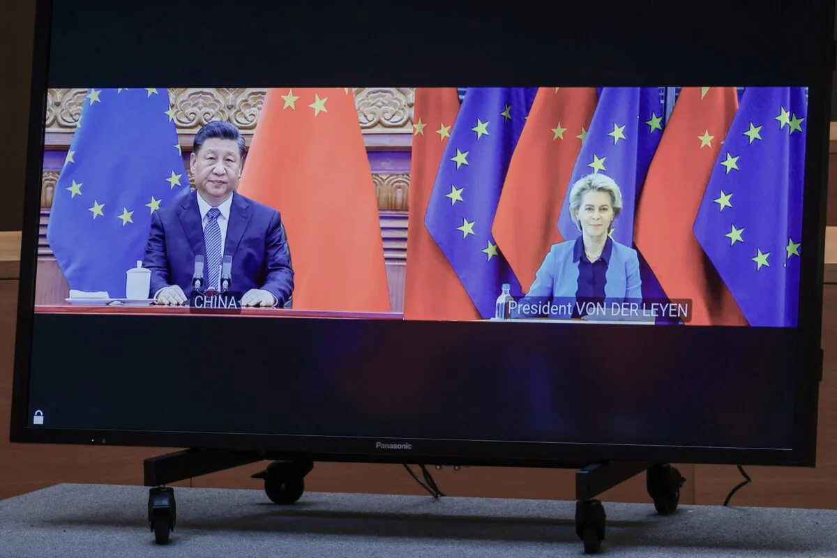Chinese leader Xi Jinping and European Commission President Ursula von der Leyen speak via video conference with the European Council president and European Union foreign policy chief during an EU-China summit at the European Council building in Brussels on April 1, 2022. (Olivier Matthys/Pool/AFP via Getty Images)
