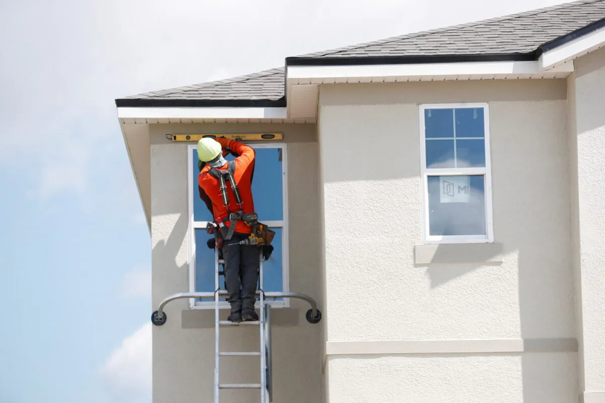 A carpenter works on new townhomes in Tampa, Fla., on May 5, 2021. (Octavio Jones/Reuters)