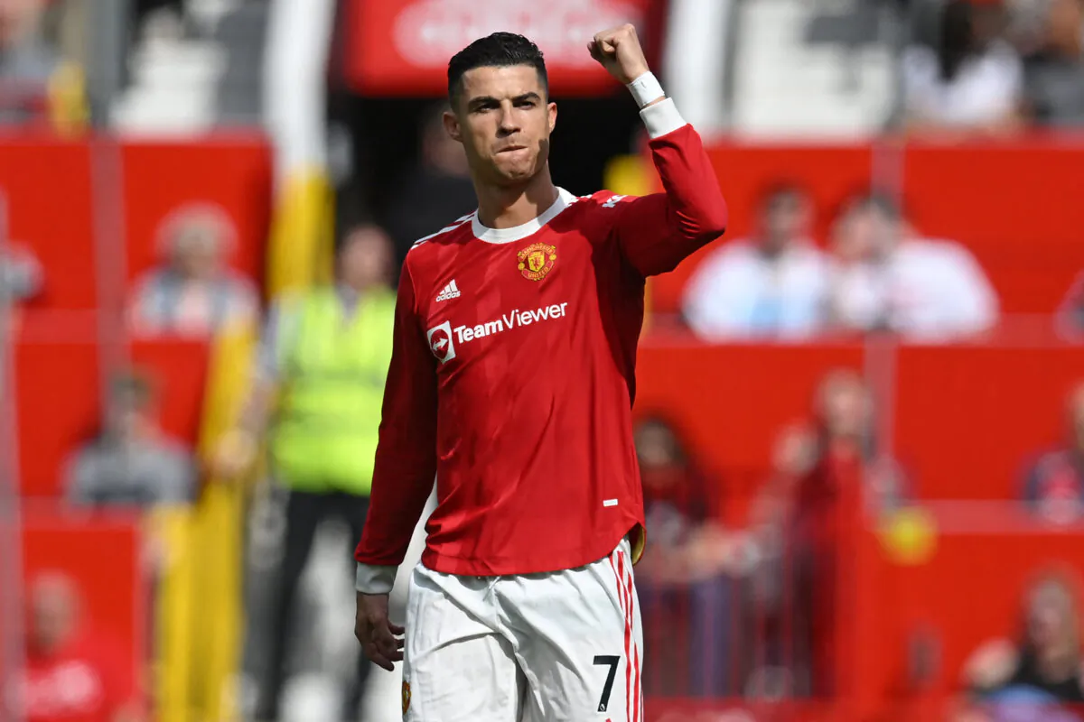 Manchester United's Portuguese striker Cristiano Ronaldo celebrates after scoring the opening goal of the English Premier League football match between Manchester United and Norwich City at Old Trafford, in Manchester, England, on April 16, 2022 (PaulL Ellis/Getty Images)