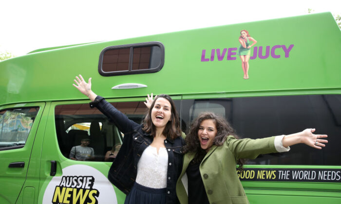 Buzzfeed Mates Aurore DuPont-Sagorin and Anna Mazzilli of France pose with a Juicy campervan at the launch of Aussie News Today, as part of Tourism Australia's new youth campaign on Oct. 6, 2017 in Sydney, Australia.  (Cameron Spencer/Getty Images for Tourism Australia)