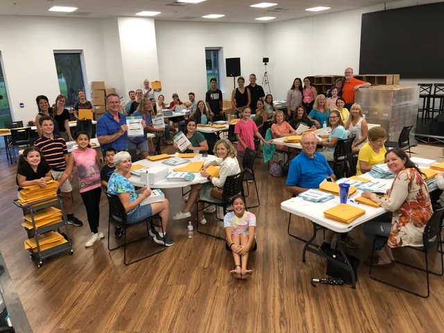 Volunteers with Human Life Protection Amendment campaign help assemble packets of petitions in Gainesville, Fla. on July 6, 2021. (Courtesy of Mark Minck)