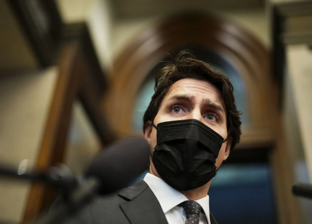 Prime Minister Justin Trudeau talks to reporters as he arrives to the House of Commons for question period on Parliament Hill in Ottawa on April 5, 2022. (The Canadian Press/Sean Kilpatrick)