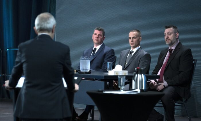 (L–R) RCMP constables Adam Merchant, Aaron Patton, and Stuart Beselt are questioned by commission counsel Roger Burrill at the Mass Casualty Commission inquiry into the mass murders in rural Nova Scotia on April 18 and 19, 2020, in Halifax on March 28, 2022. (The Canadian Press/Andrew Vaughan)
