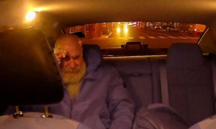 A man authorities identified as Jerry Braun rides in an Uber in Washington on Jan. 6, 2021. (DOJ via The Epoch Times)