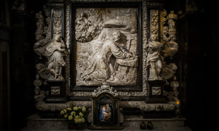 A detailed view of the altarpiece shows Saint Ignatius of Loyola writing the Spiritual Excercises at the Cave of Saint Ignatius of Loyola in Manresa, Spain, on May 2, 2013. (David Ramos/Getty Images)