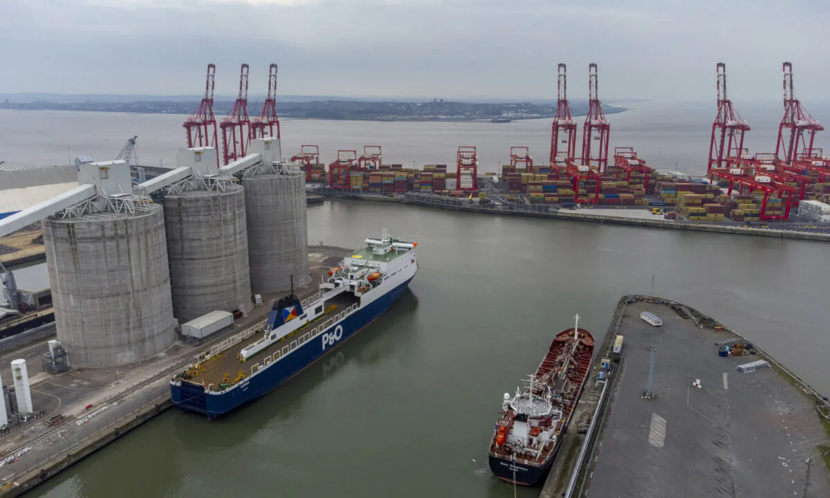 General view of P&O ferry Norbay (Lt) moored at Gladstone Dock in Liverpool, England, on March 21, 2022. (Pete Byrne/PA)