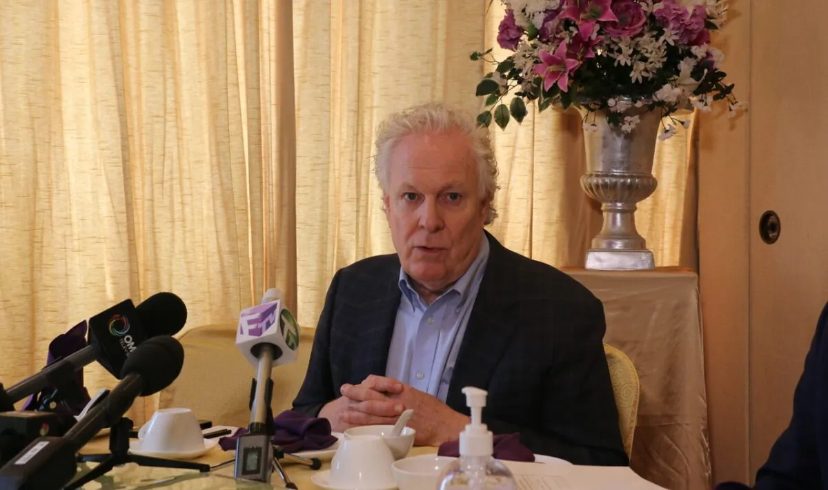 Conservative Party leadership candidate Jean Charest speaks with reporters during an event in Toronto on April 20, 2022. (Andrew Chen/The Epoch Times)