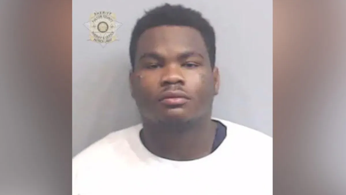 Christian Eppinger in a booking photo. (Courtesy of Fulton County Sheriff's Office)