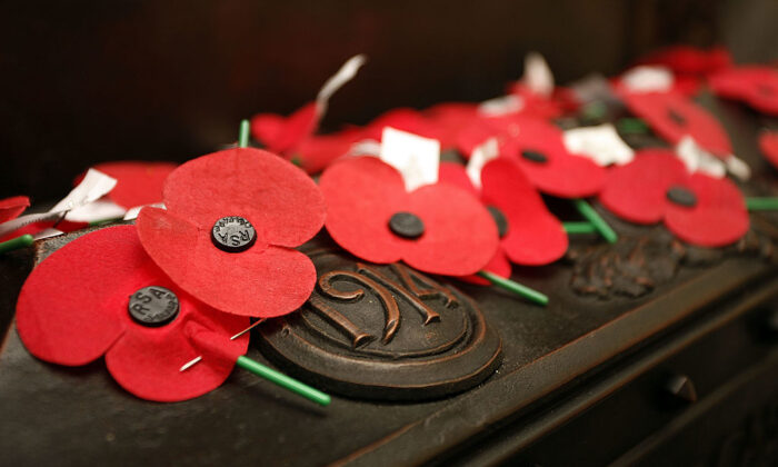 Remembrance poppies cover the shrine inside the Cenotaph in Wellington, New Zealand, on April 25, 2011. (Hagen Hopkins/Getty Images)