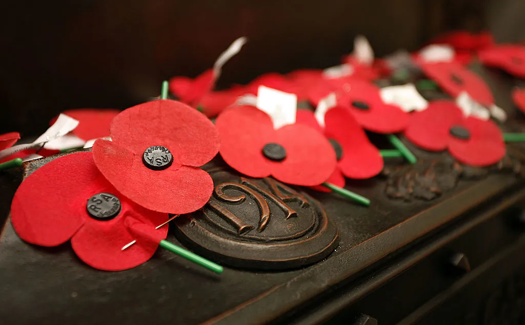 Remembrance poppies cover the shrine inside the Cenotaph in Wellington, New Zealand, on April 25, 2011. (Hagen Hopkins/Getty Images)