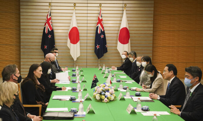 Japanese Prime Minister, Fumio Kishida (second right), talks with New Zealand Prime Minister, Jacinda Ardern (third left), during a meeting at his official residence in Tokyo, Japan on April 21, 2022. (Kimimasa Mayama/Getty Images)