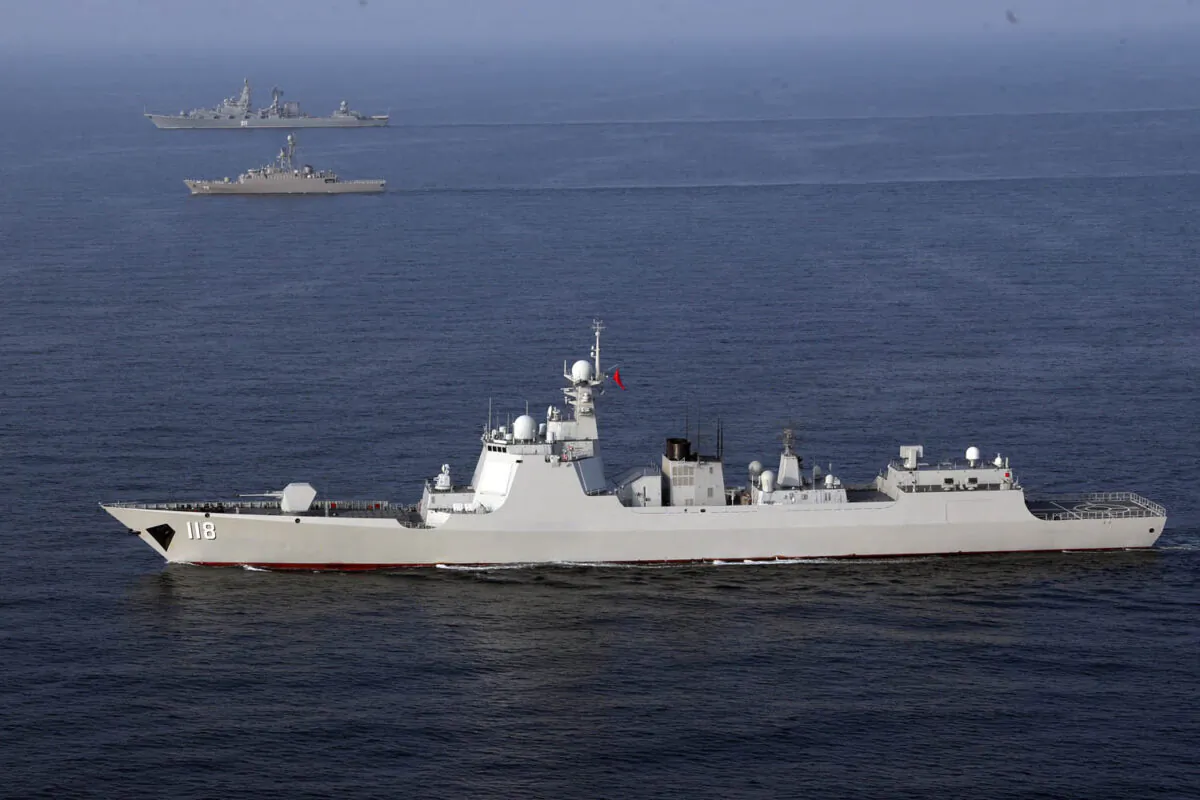 Chinese, Russian, and Iranian warships conduct a joint military drill in the Indian ocean, on Jan. 21, 2022. (Iranian Army office/AFP via Getty Images)