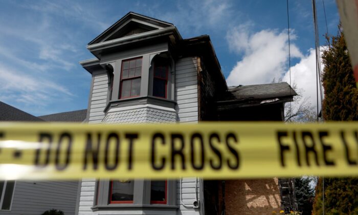 Police on April 21, continued to investigate an arson attack on the family home of a pastor in Victoria, B.C.. (The Canadian Press/Chad Hipolito)