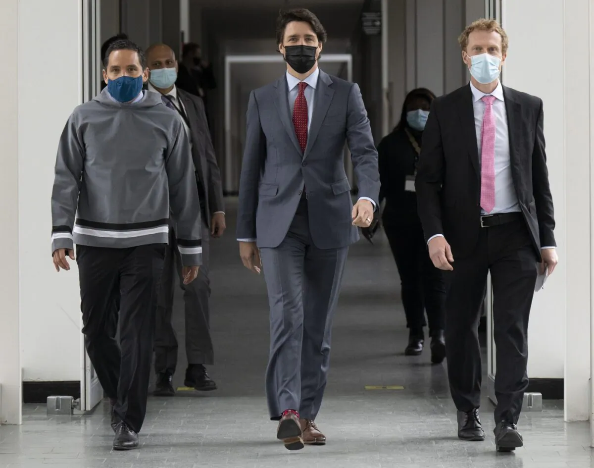 Canadian Prime Minister Justin Trudeau walks with President of the Inuit Tapiriit Kanatami Natan Obed and Crown-Indigenous Relations Minister Marc Miller to a news conference following a meeting of the Inuit-Crown Partnership Committee, April 21, 2022 in Ottawa. (The Canadian Press/Adrian Wyld)
