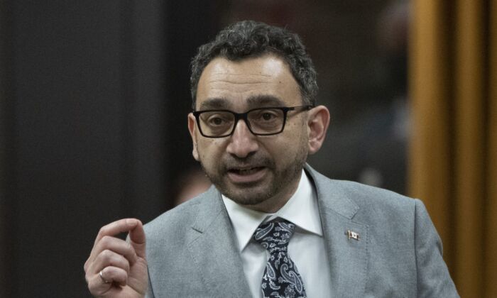 Transport Minister Omar Alghabra rises during Question Period in Ottawa on Feb. 14, 2022. (Adrian Wyld/The Canadian Press)
