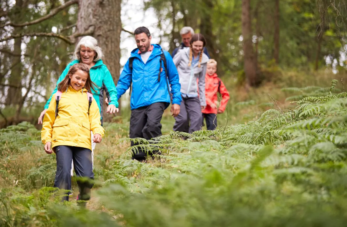 Enjoying more free activities, such as hiking or visiting the park, are a great way to keep spending down. (Monkey Business Images/Shutterstock)