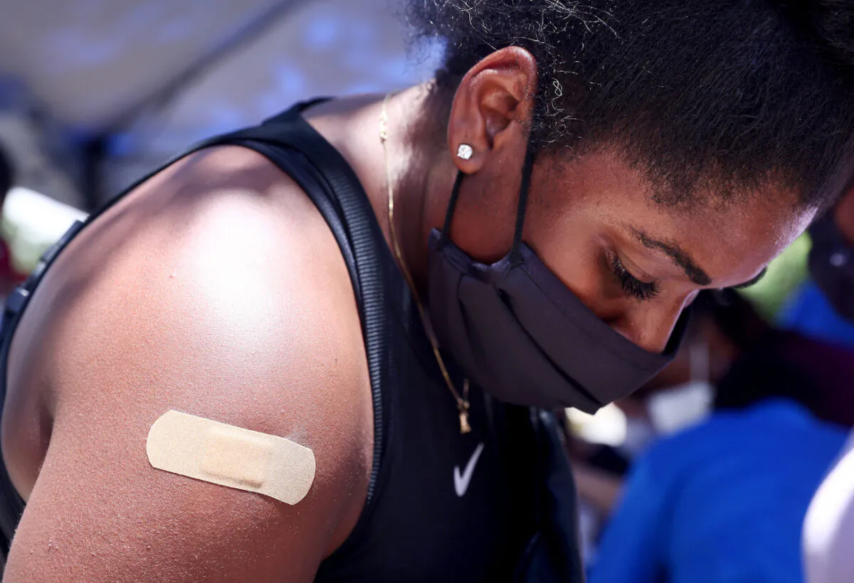 A person fills out a form after receiving a COVID-19 vaccination dose in New Orleans, La., on Aug. 14, 2021. (Mario Tama/Getty Images)
