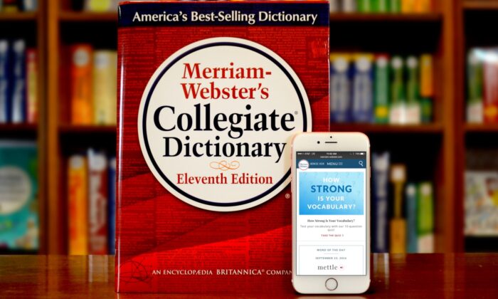 Merriam-Webster's Collegiate Dictionary and mobile website are displayed in Springfield, Massachusetts, on Sept. 23, 2016. (Joanne K. Watson/Merriam-Webster via Getty Images)