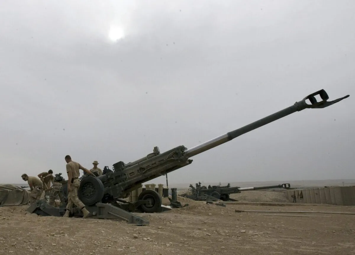 Soldiers with the Royal Canadian Horse Artillery B Troop move their M777 155mm Howitzer at the forward operating base in Helmand Province, Afghanistan April 15, 2007. (The Canadian Press/Ryan Remiorz)