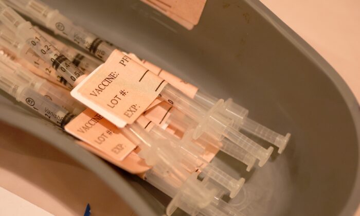 Syringes filled with a COVID-19 vaccine in California in a file photograph. (Justin Sullivan/Getty Images)