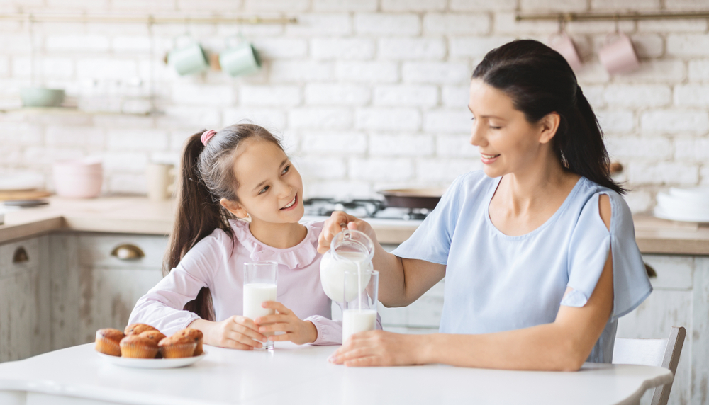 Women who consume as little as 1/4 to 1/3 cup of dairy milk per day increase their risk of developing breast cancer by about 30 percent. (Shutterstock)