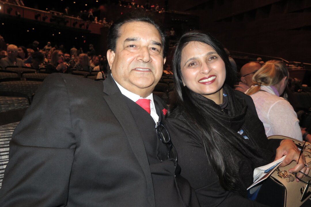 Vijay Dosoar and his wife at Northern Alberta Jubilee Auditorium in Edmonton on April 23, 2022. (Sunny Chen/The Epoch Times)