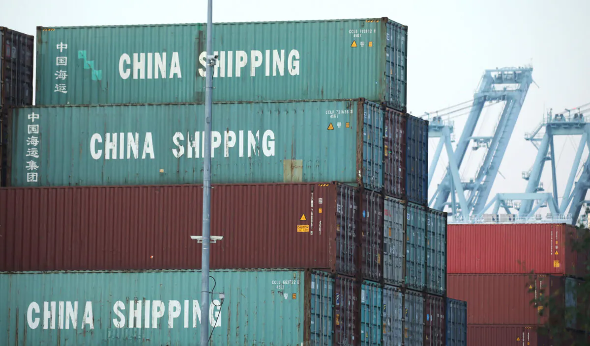 Shipping containers, some marked "China Shipping," are stacked at the Port of Los Angeles, Calif., on Nov. 7, 2019. (Mario Tama/Getty Images)