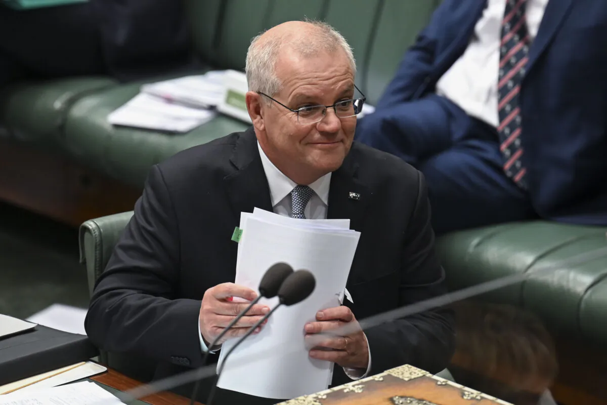 Australian Prime Minister Scott Morrison reacts during question time in the House of Representatives at Parliament House in Canberra, Australia on March 30, 2022. (Martin Ollman/Getty Images)