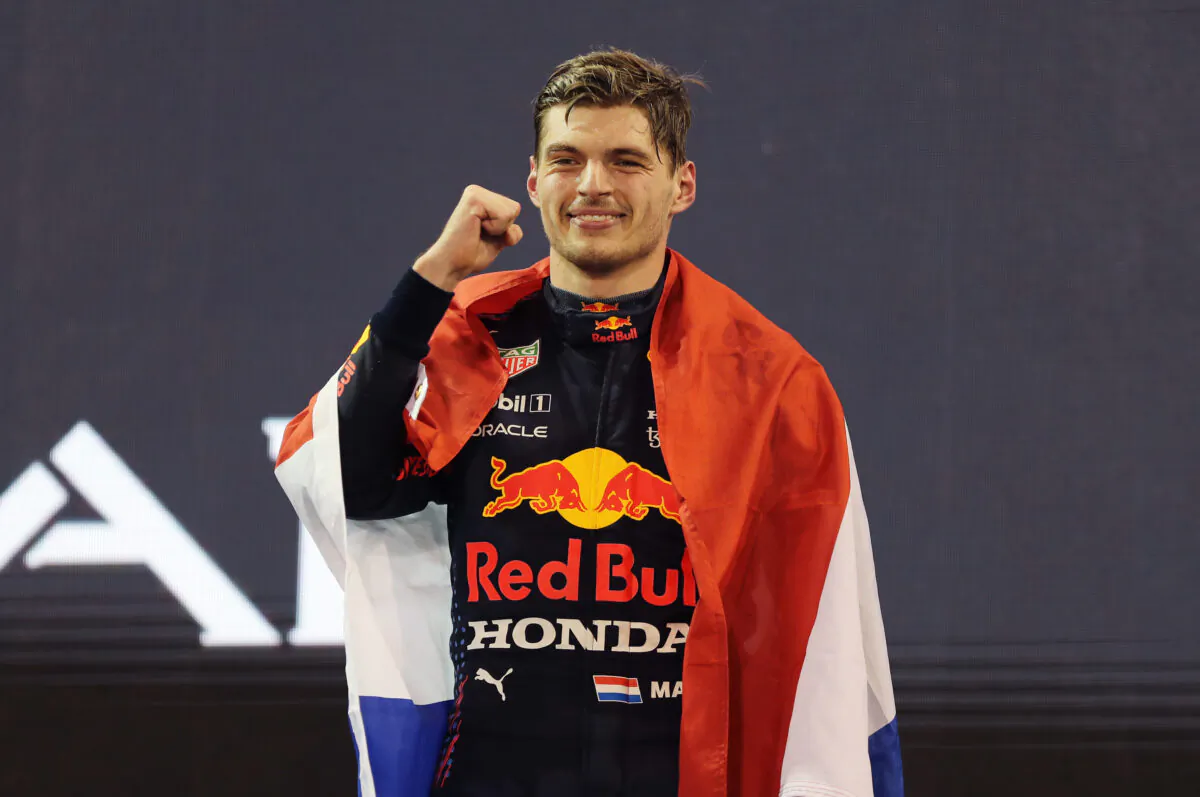Max Verstappen of the Netherlands and Red Bull Racing celebrates on the podium during the F1 Grand Prix of Abu Dhabi at Yas Marina Circuit in Abu Dhabi, United Arab Emirates, on Dec. 12, 2021. (Kamran Jebreili - Pool/Getty Images)