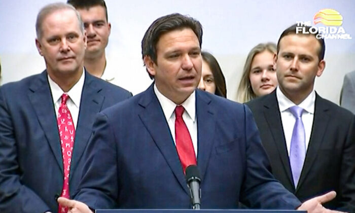 Florida Gov. Ron DeSantis holds a press conference in The Villages and signs SB 7044 on April 19, 2022. (Screenshot, The Florida Channel)